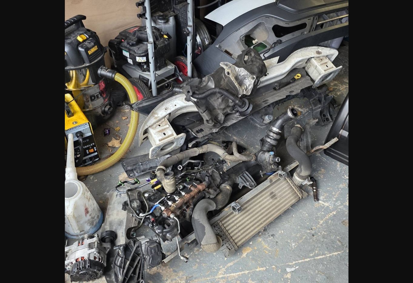 Vehicle components removed for inspection and repair