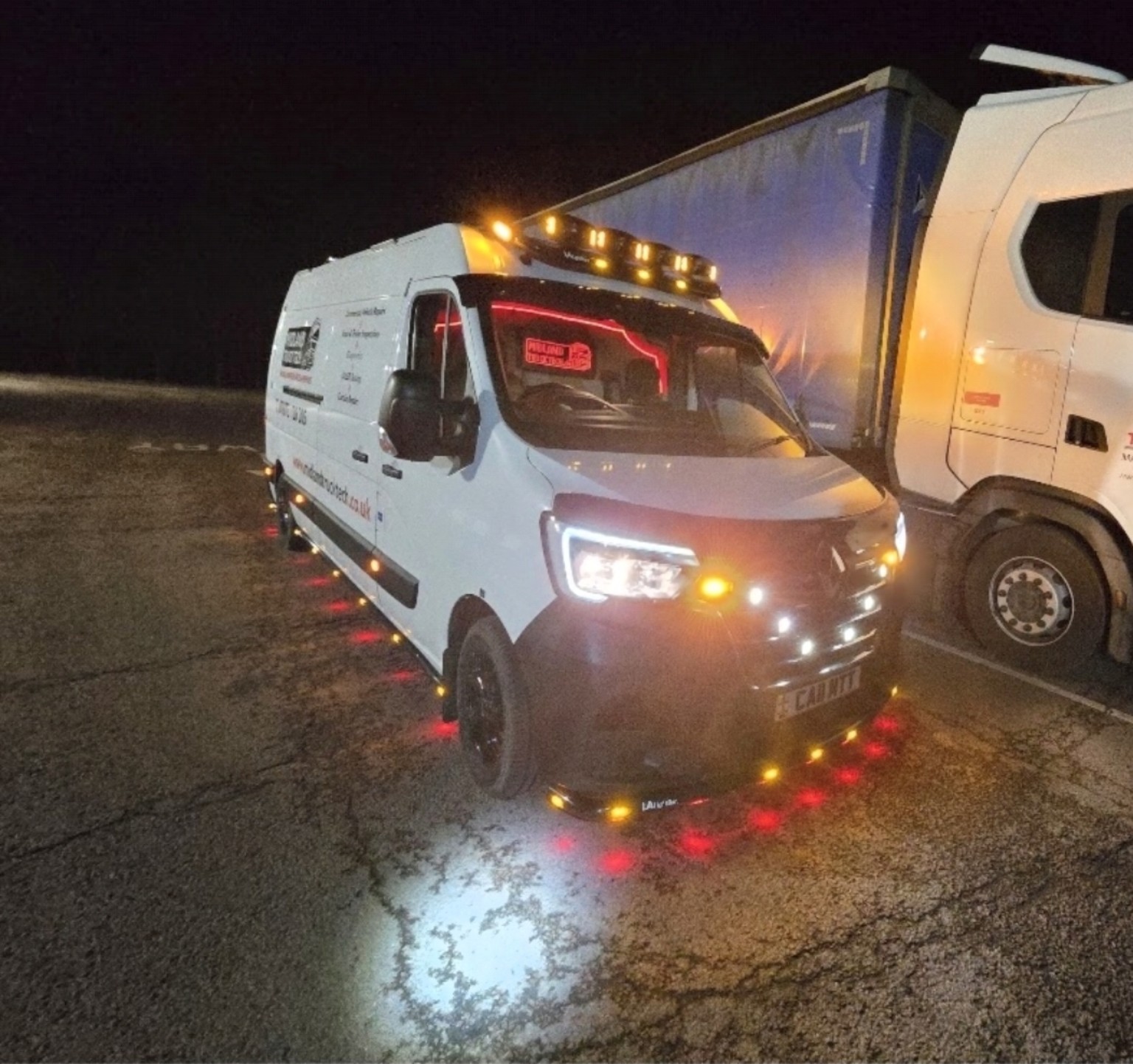 Midland Truck Tech service van working at night